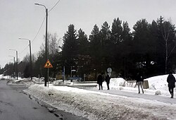 Pedestrians walking in winter conditions in Pornainen, Finland.