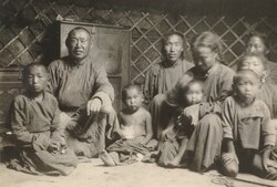 A Mongol family in their ger, 1920
