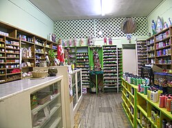 Botánicas such as this one in Jamaica Plain, Boston, cater to the Latino community and sell folk medicine alongside statues of saints, candles decorated with prayers, lucky bamboo, and other items.