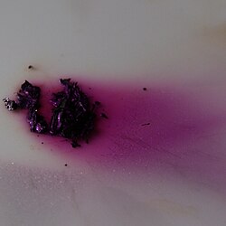 Iodine crystals sublimating into a purple gas