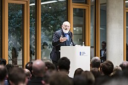 Timmermans delivering a speech about the Green Deal at the European Investment Bank Headquarters