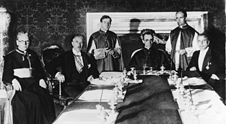 Pacelli (seated, center) at the signing of the Reichskonkordat on 20 July 1933 in Rome with (from left to right): German prelate Ludwig Kaas, German Vice-Chancellor Franz von Papen, Secretary of Extraordinary Ecclesiastical Affairs Giuseppe Pizzardo, Alfredo Ottaviani, and Reich minister Rudolf Buttmann