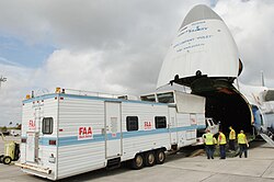 A US mobile air traffic control tower is moved to Haiti by a Russian Antonov An-124 Ruslan.