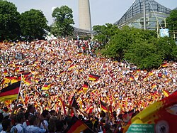 Celebrating fans in Olympiapark in Munich during the opening match between Germany and Costa Rica