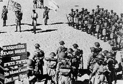 Jewish Brigade headquarters under the Union Flag and Jewish flag