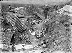 A German machine gun position just after its capture by New Zealand soldiers, with a dead German among the debris, Grevillers, 24 August 1918, Hundred Days Offensive