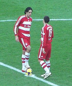 Luca Toni and Klose playing for Bayern Munich against Hertha BSC in 2009