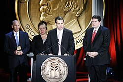 Tom Moore, Karen Gadbois, Lee Zurik and Dominic Massa accept an award for NOAH Housing Program Investigation at the 68th Annual Peabody Awards.