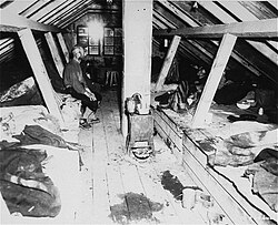 Inside a barracks at Kaufering IV, a subcamp of Dachau, after liberation