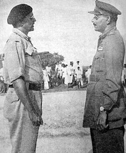 Major General El Edroos (at right) offers his surrender of the Hyderabad State Forces to Major General (later Army Chief) J.N. Chaudhuri at Secunderabad