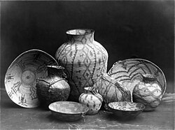 Various Apache containers: baskets, bowls and jars. Apache women wove yucca, willow leaves, or juniper bark into baskets that could hold heavy loads.[52]