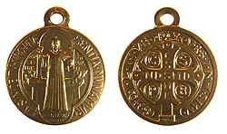 The two sides of a Saint Benedict medal