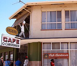 Bilingual German-English sign at a bakery in Namibia, where German is a national language