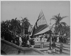 On August 12, 1898, the flag of the Hawaiian Kingdom over ʻIolani Palace was lowered to raise the United States flag to signify annexation.