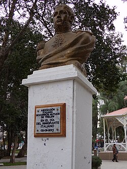 Monument to Manuel Belgrano in Trelew, Chubut Province, with a plaque commemorating the "Italian Immigrant Day". Manuel Belgrano was the politician and military leader who created the Flag of Argentina. His father was Italian.