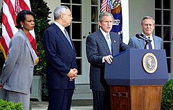 Powell, National Security Advisor Condoleezza Rice and Secretary of Defense Donald Rumsfeld listen to President George W. Bush speak.