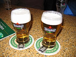 Two glasses of Heineken beer