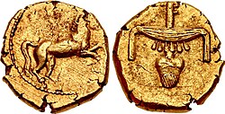 Egyptian gold stater of Nectanebo II: reverse with hieroglyphs nfr-nb minted in Egypt (around 360 BC).[106]
