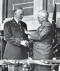 President Harry S. Truman awarding General Marshall an Oak Leaf Cluster to his Distinguished Service Medal on 26 November 1945