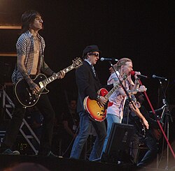 Original member Izzy Stradlin' on stage with Guns N' Roses in 2006