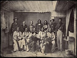 This rare photograph by an unknown photographer shows the ill-fated Cheyenne chief, Black Kettle, and a number of his associates at Camp Weld, on the outskirts of Denver. They had assembled there September 28, 1864.