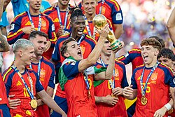 Gavi holding the FIFA World Cup Trophy after Spain won the 2026 final