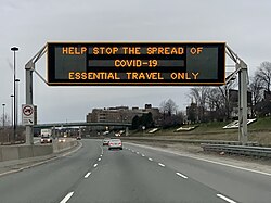 A highway sign discouraging travel in Toronto, March 2020
