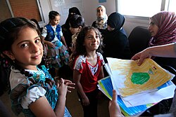 Refugee children from Syria at a clinic in Ramtha, Jordan, August 2013
