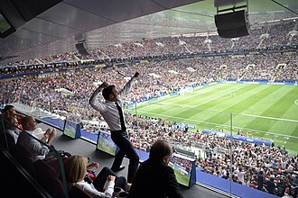 Macron celebrating France's victory over Croatia in the 2018 World Cup final in Moscow, Russia
