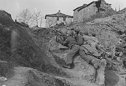 Soldiers of the Brazilian Expeditionary Force in a trench during the Battle of Montese, 1945