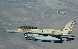 An Israeli F-16I Block 52 with conformal fuel tanks (CFTs), electronic countermeasures, and other external stores during a Red Flag exercise at Nellis AFB, Nevada