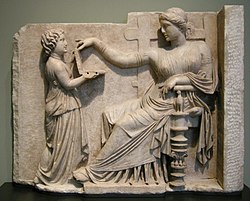 Geoffrey Hosking suggests that fear of being enslaved was a central motivating force for the development of the Greek sense of citizenship. Sculpture: a Greek woman being served by a slave-child.