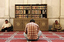 Men reading the Quran at the Umayyad Mosque, Damascus, Syria