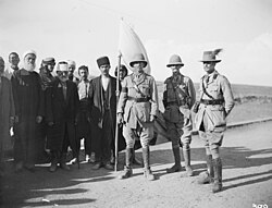 A group (including Brigadier General Grant, 4th Brigade, on the right), taken at Kuneitra, after the surrender of the town to Major General Hodgson, commander of the Australian Mounted Division (left), on 28 September 1918.