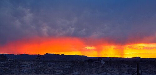 A sunset sunshower in the Mojave Desert