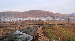 A typical settlement along the main road in South Pyongan Province near Pyongsong.