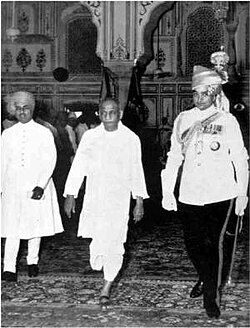 Sardar Patel (centre) leaving the Durbar Hall in Jaipur after the inauguration of the Rajasthan Union in 1949. On the right is Man Singh II, the Maharaja of Jaipur and the first Rajpramukh of the Union; on the left is the Maharaja of Kotah