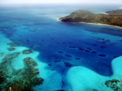 Aerial view towards Manzanillo beach and Old Providence McBean Lagoon on the east coast of Providencia Island