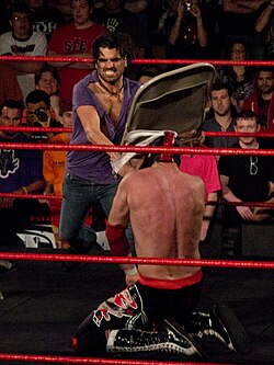 Jimmy Jacobs strikes El Generico with a folding chair. Within wrestling's fictional storylines, such attacks will get a wrestler disqualified in most matches if caught by a referee.