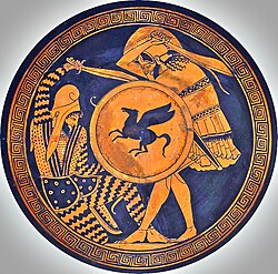 Greek hoplite and Persian warrior depicted fighting, on an ancient kylix, 5th century BC