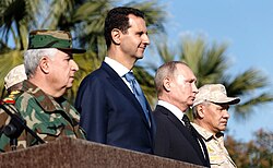 Syrian president Bashar al-Assad, Russian president Vladimir Putin, and defence minister Sergei Shoigu at Khmeimim Air Base, December 2017
