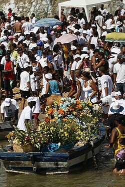 On the Dia de Iemanjá, offerings to Iemanjá are taken to the water in Rio.[241]