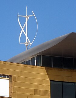 A small Quietrevolution QR5 Gorlov-type vertical-axis wind turbine on top of the Bristol Beacon in Bristol, England. Measuring 3 m in diameter and 5 m high, it has a nameplate rating of 6.5 kW to the grid.