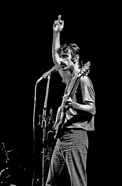 Zappa giving the finger during a show in Hamburg, September 1974