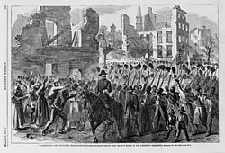 Colored Troops singing "John Brown's Body" as they marched into Charleston, South Carolina, in February 1865. Note the attitude of the local population, and the white officers.