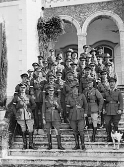 Lieutenant General Sir Harry Chauvel with his Desert Mounted Corps Headquarters staff, in front of his HQ building, now Rehovot, Israel; photo by Frank Hurley