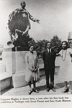Langston Hughes at Tuskegee Institute with Jessie Fauset (left) and Zora Neale Hurston, 1927.[57][58]