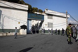 The entrance to Evin Prison, established in 1972. VICE describes the prison as the "legendary terrifying place that nobody wants to end up."[397]