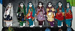 Handmade dolls featuring traditional attire in Afghanistan