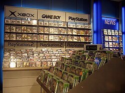 A retail display in Switzerland with a large selection of games for platforms popular in the early 2000s
